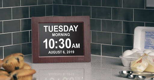 Date and time display clock on kitchen counter