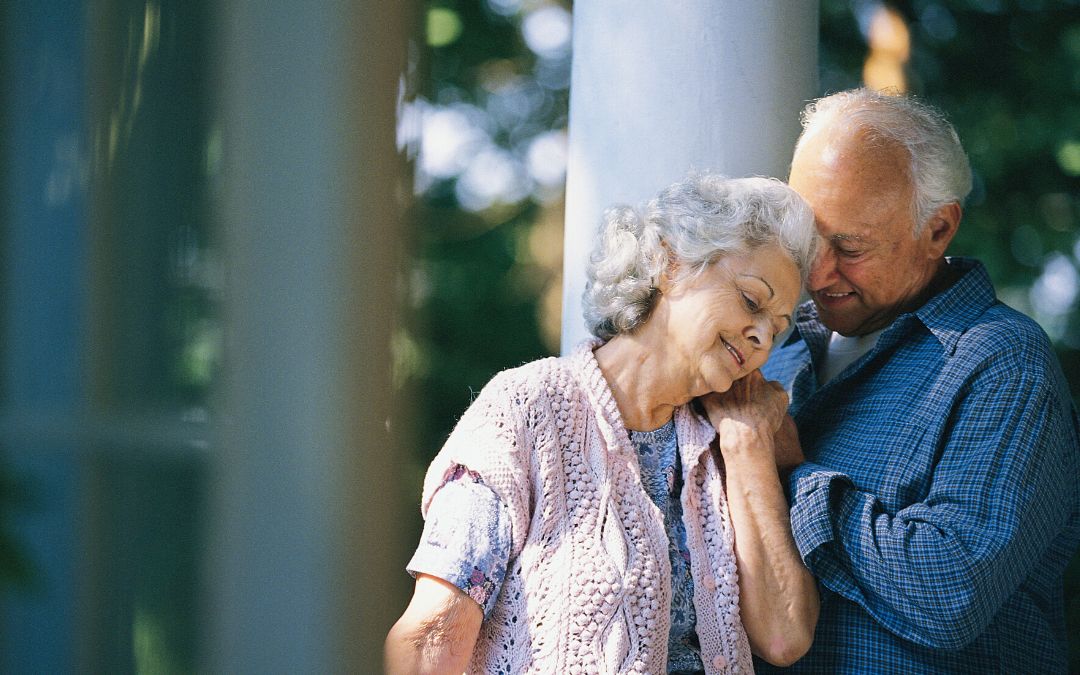 Senior couple hugging